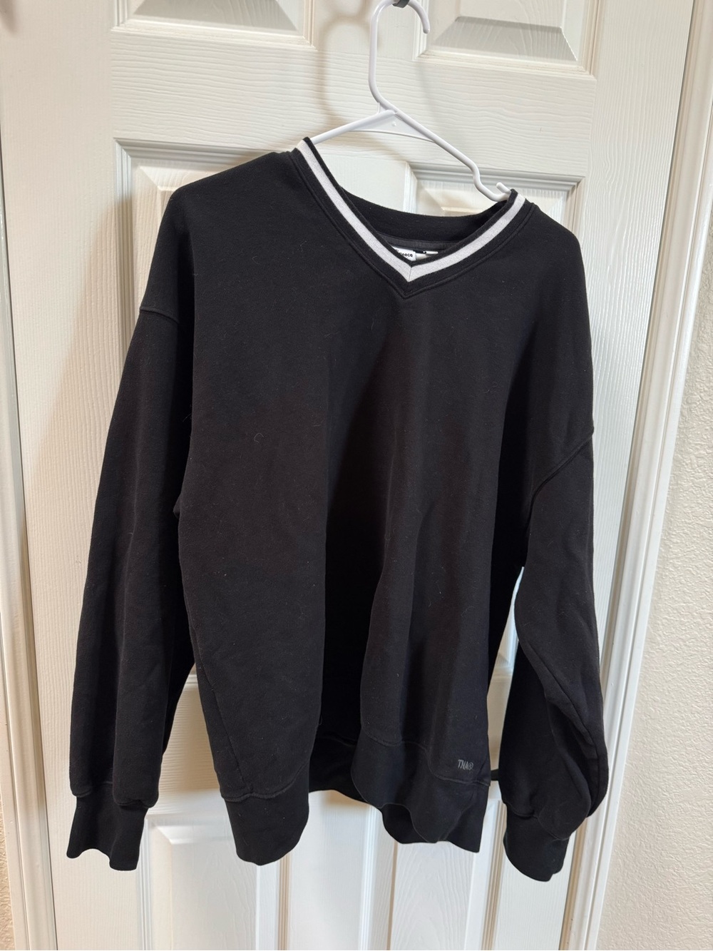 TNA by Aritzia Black V-Neck Sweater with White Stripe Trim boyfriend fit